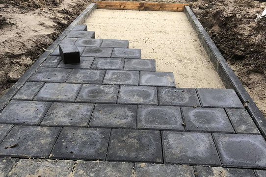 oprit aanleggen